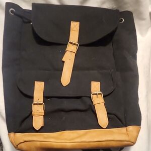 DSW EUC Black and Tan Backpack snap closure lots of pockets